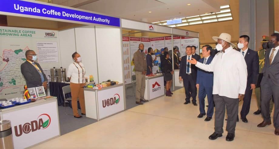 President Yoweri Museveni and Vietnamese officials at the UCDA exhibition booth 